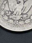 FOUR MORGAN SILVER DOLLARS