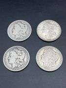 FOUR MORGAN SILVER DOLLARS