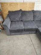 3 PIECE - SECTIONAL COUCH - CHARCOAL GRAY - COUPLE BOARDS LOOSE IN BACK DOES NOT AFFECT SITTING