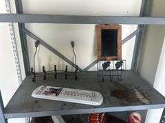 Metal Shelving Unit with Assorted Items