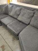 3 PIECE - SECTIONAL COUCH - CHARCOAL GRAY - COUPLE BOARDS LOOSE IN BACK DOES NOT AFFECT SITTING