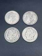 FOUR MORGAN SILVER DOLLARS