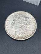 TWO MORGAN SILVER DOLLARS
