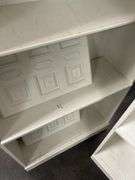 White Painted Wood Bookshelf with Decorative Panels