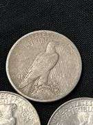 Three 1923 US Peace Silver Dollars