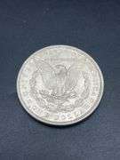 THREE MORGAN SILVER DOLLARS