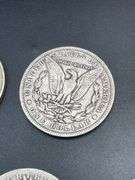 FOUR MORGAN SILVER DOLLARS