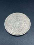FIVE MORGAN SILVER DOLLARS