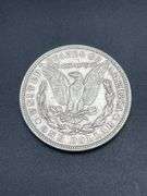 THREE MORGAN SILVER DOLLARS