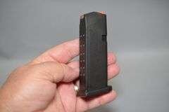 Glock Model 27 Pistol With Laser In .40 S&W Caliber,