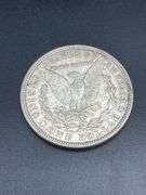 FIVE MORGAN SILVER DOLLARS