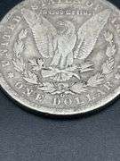 TWO MORGAN SILVER DOLLARS