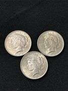 Three 1925 US Peace Silver Dollars
