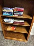 Wooden Bookcase with Books and Crochet