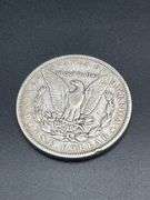 THREE MORGAN SILVER DOLLARS