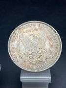 TWO MORGAN SILVER DOLLARS