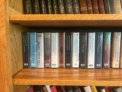 Book Shelf and Collection of John MacArthur 'Grace to You' Books, Commentaries, and Media