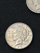 Three 1923 Peace Silver Dollars