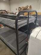 TWIN OVER TWIN BUNK BEDS WITH BUILT IN LADDER IN EACH END WITH TOP SAFETY RAILS - MATTRESSES WILL BE GIVEN TO BUYER IF WANTED