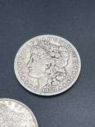 THREE MORGAN SILVER DOLLARS
