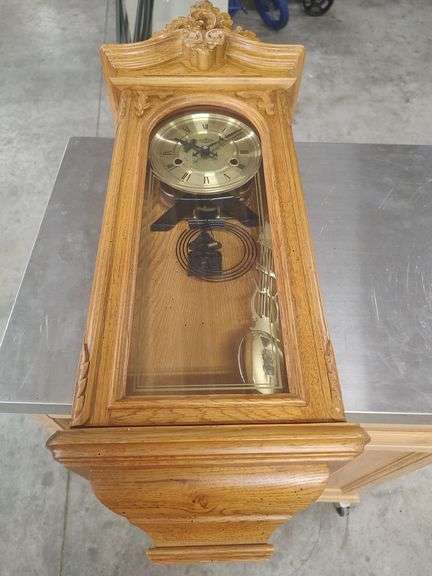 D & A OAK WALL HANGING CLOCK WITH WINDING KEY - 29 X12 image