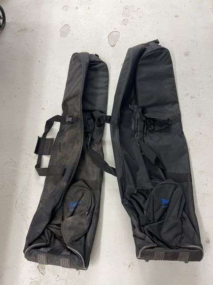Pair of Black Rolling Golf Travel Bags image