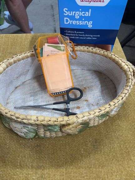 LITTLE BASKET OF BANDAGES, TRAVEL SEWING KIT, AND FORCEPTS image
