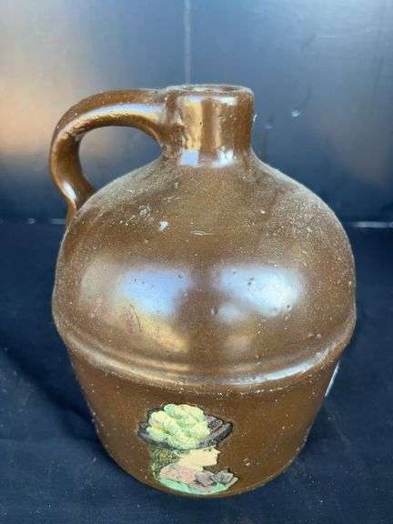 Brown Stoneware Jug with Woman Graphic image