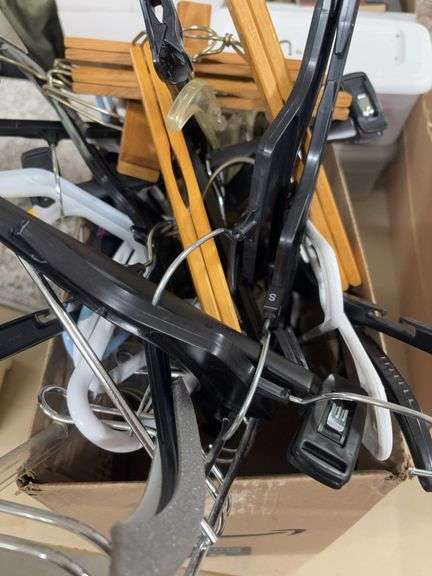 BOX OF CLOTHES HANGERS image