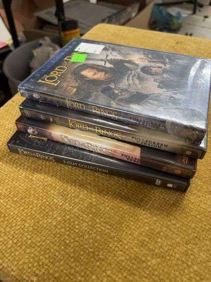 FOUR LORD OF THE RINGS DVDS. image