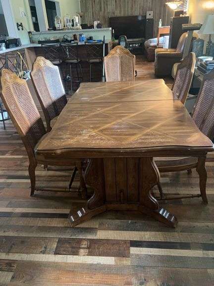 Wooden Dining Table with Six Cane Back Chairs image