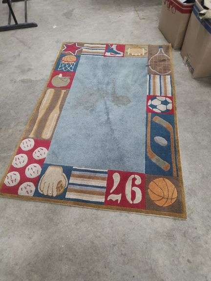 KIDS SPORTS RUG - 4 FT X 6 FT - NEEDS CLEANED image