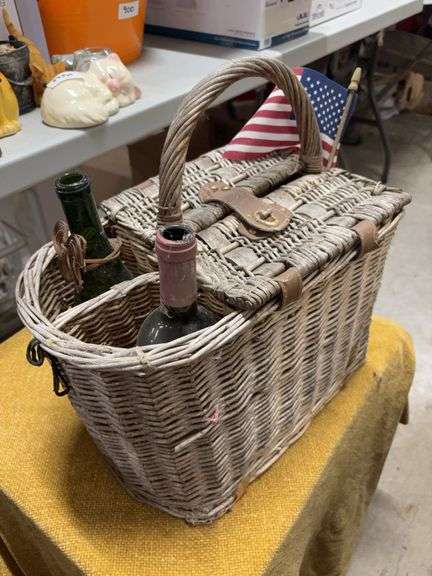 VINTAGE PICNIC BASKET AND TWO WINE BOTTLES image