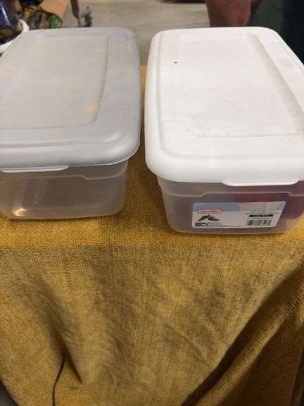 TWO PLASTIC CONTAINERS.  ONE HAS GNC MIXING CUPS image