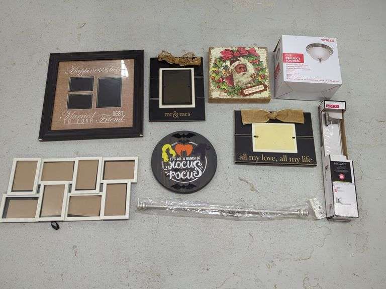 Picture Frames, Hocus Pocus Sign, Ceiling Light, and Towel Bars image