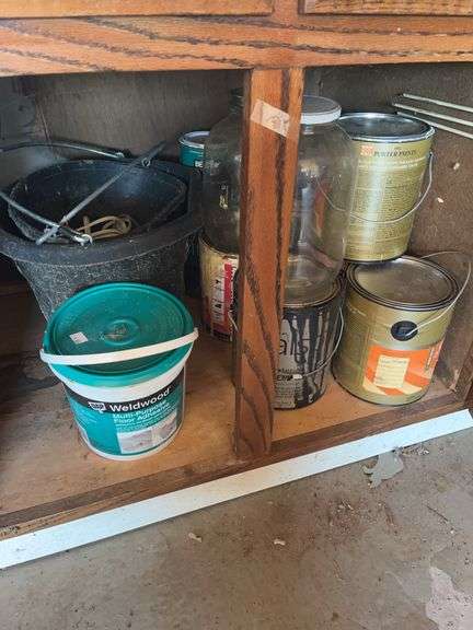 Assorted Paints and Weldwood Multi-Purpose Floor Adhesive image