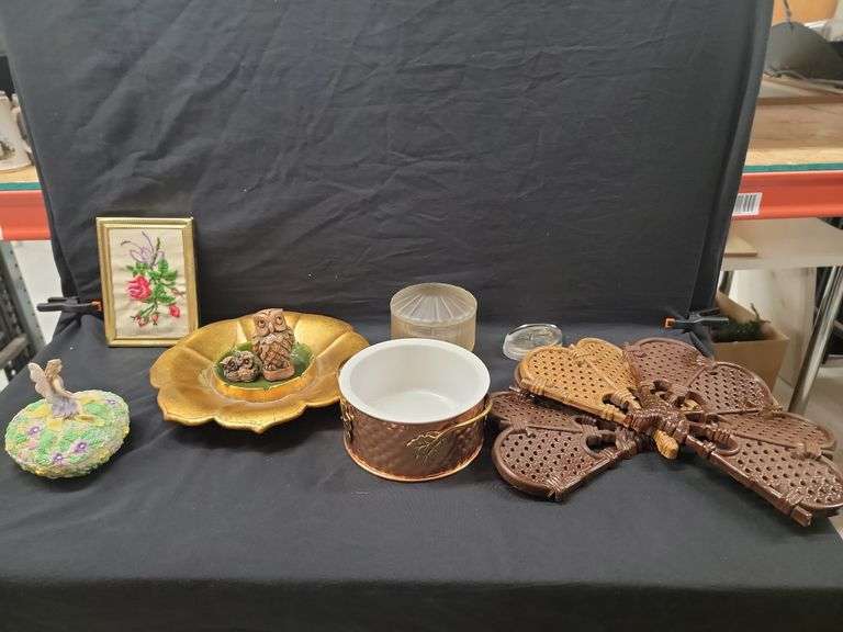 Decorative Assortment Featuring Art, Trinkets, and More image