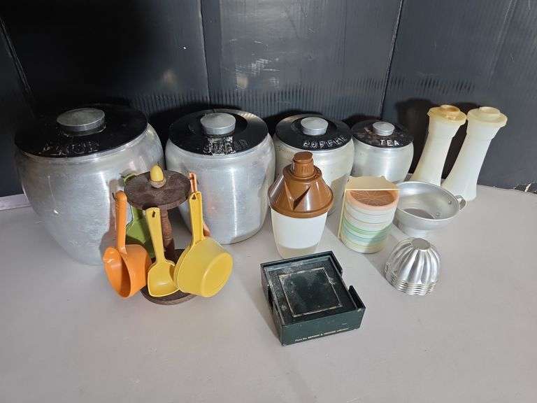 Assorted Kitchenware: Canisters, Tupperware, Baking Molds, and More image