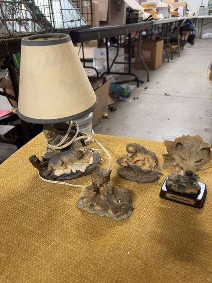 WOLF LAMP AND THREE WOLF STATUES image