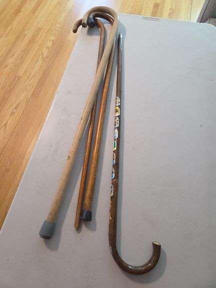Four Assorted Wooden Walking Sticks and Canes image