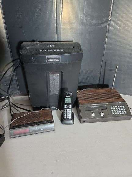 Fellowes W-6C Paper Shredder, Emerson Clock Radio, Realistic Pro-2003 Scanner, and Panasonic Phone image