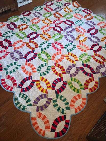 Handmade Double Wedding Ring Quilt with Colorful Fabric Rings image