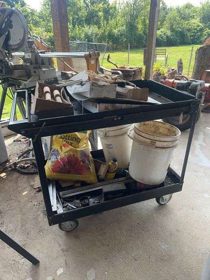 Rolling Cart with Tools, Buckets, and Potting Soil image