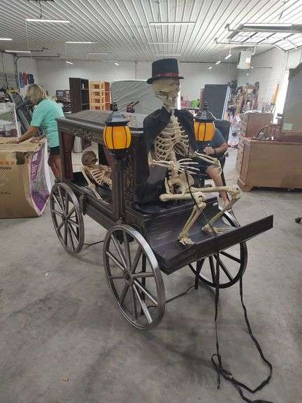 HOME DEPOT - 5 FT GRAVE & BONES ANIMATED LED HEARSE WITH SKELETON DRIVER AND 5 FT SKELETON BODY - HALLOWEEN DECORATION ANIMATRONIC image