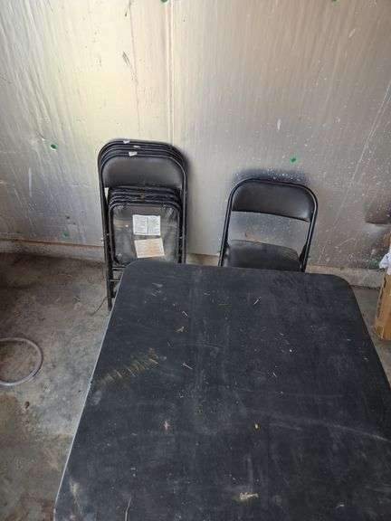 Folding Table with Four Folding Chairs image