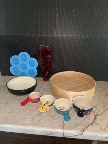 Variety of Kitchen Items: Measuring Cups, Sango Bowl, Red Glass Jar, Steamer image