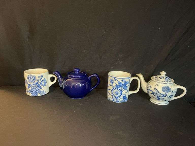 Collection of Teapots and Mugs with Blue Floral Designs image