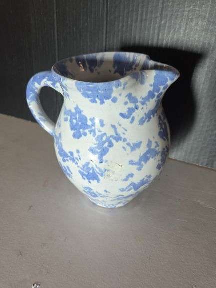 Handcrafted Pottery Pitcher with Blue Floral Design image