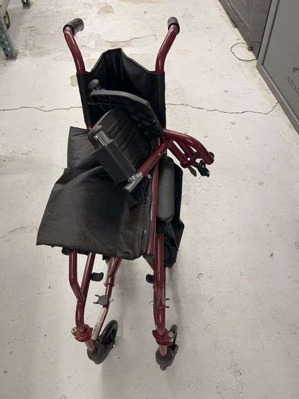 Red Four-Wheel Mobility Walker with Seat and Storage Bag image