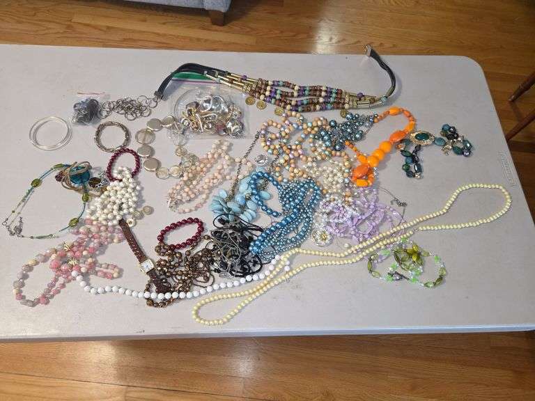 Assorted Costume Jewelry: Necklaces, Bracelets, Rings, and a Watch image